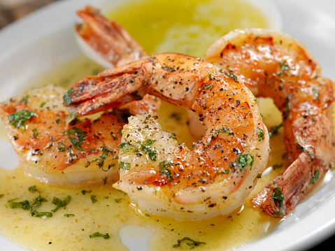 Jumbo Tiger Prawn Scampi poached in Butter and Herbs
