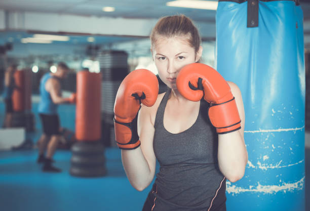 istock Woman boxing in gym 979500410