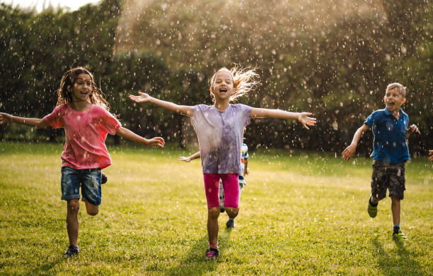 istock Kids enjoying on the rain 979502058