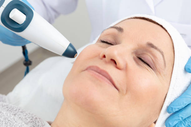 istock The cosmetologist is caring for the patient's face 979536504