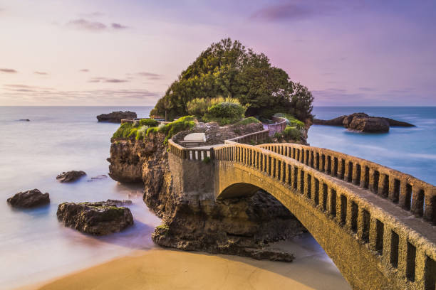 Bridge to the Rocher du Basta rock on the beach in Biarritz, France.