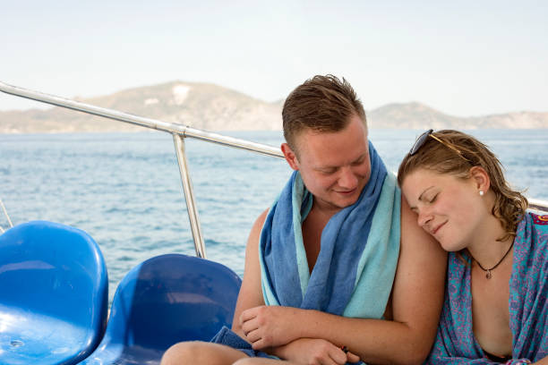 istock Young Couple on Boat Trip on Summer Vacations 979550632