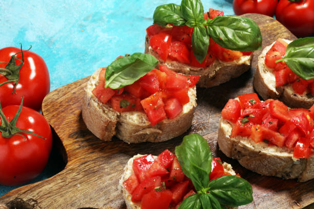 istock fresh tomato bruschetta. italian food appetizer with basil 979551282