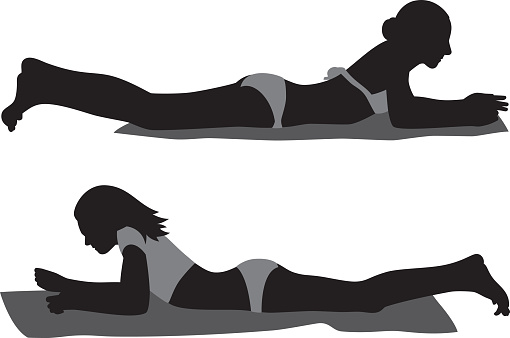 Vector silhouettes of two girls laying in bathing suits on beach blankets.