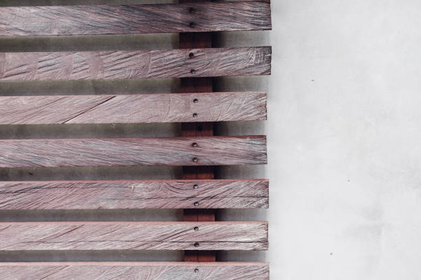 istock Light brown wooden planks wall 979558628