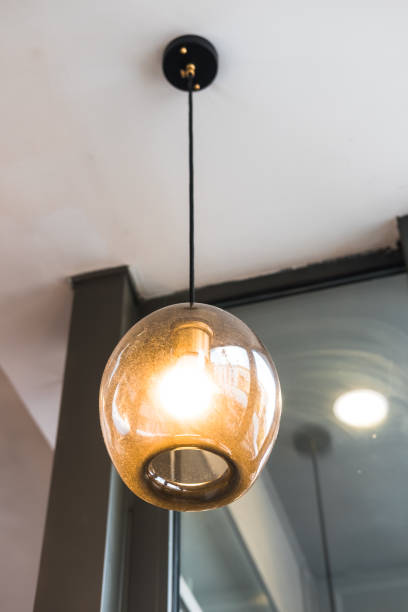 istock Color glass pendant lamp 979559262