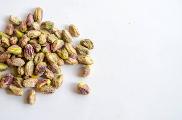 istock Pistachio Nuts shelled and scattered 979563042