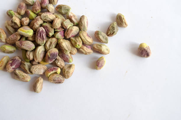istock Pistachio Nuts shelled and scattered 979563114