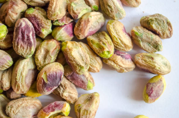 istock Pistachio Nuts shelled and scattered 979566902