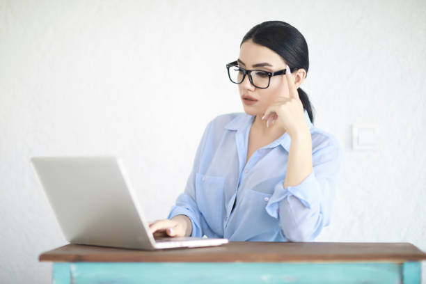 istock Beautiful Woman Working Laptop 979584546