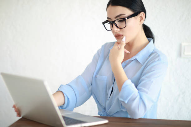 istock Beautiful Woman Working Laptop 979584554