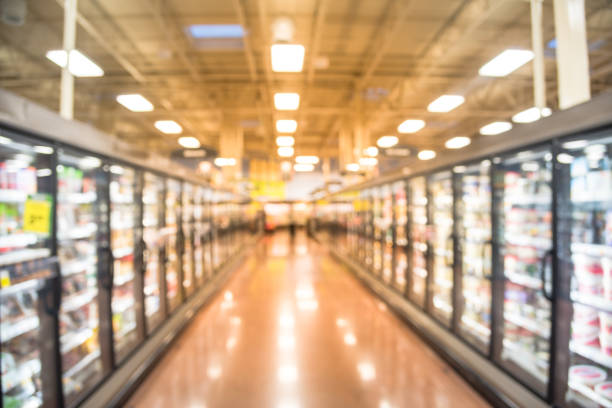 istock Abstract blurred fridge shelves different brands, flavors ice cream 979591502