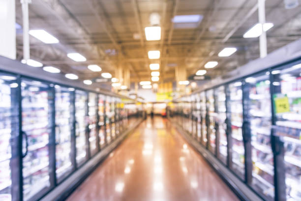 istock Vintage blurred fridge shelves different brands, flavors ice cream 979591776
