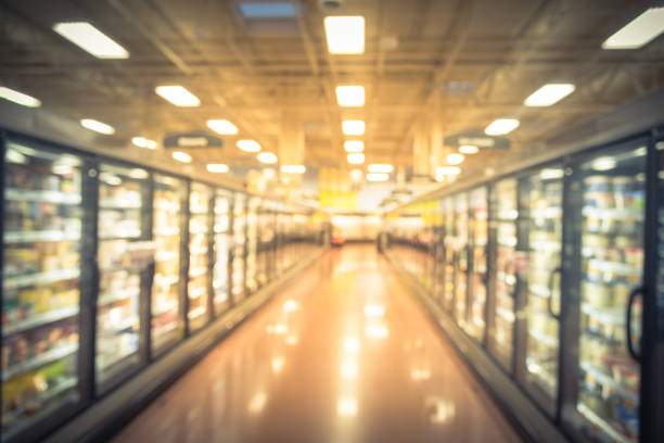 istock Abstract blurred fridge shelves different brands, flavors ice cream 979591886