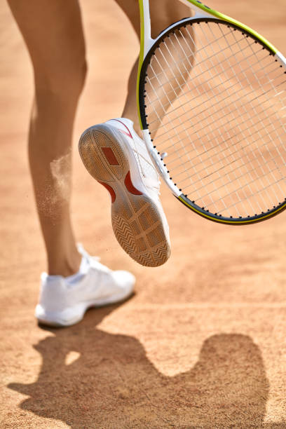 istock Sportive girl plays tennis 979603336