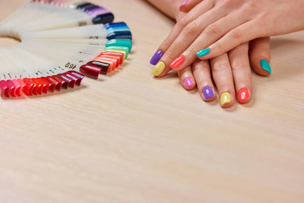 istock Summer colores female manicure. 979619710
