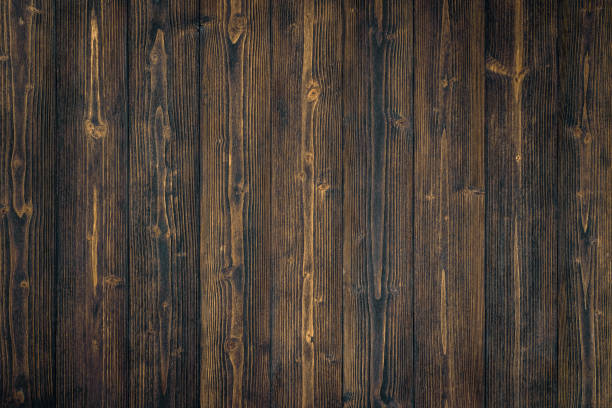 istock Dark brown wood texture with natural striped pattern background 979620256