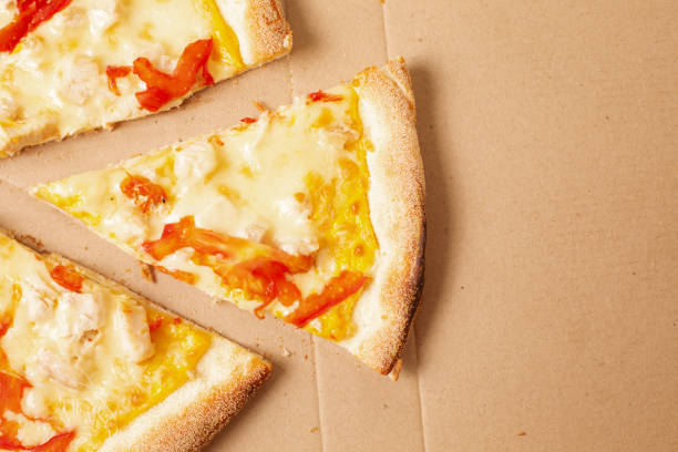 istock Delivery box with delicious pizza 979623288