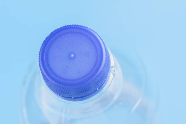 istock Plastic bottles of water close-up 979625976