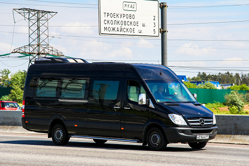 Moscow, Russia - June 2, 2012: Passenger van Mercedes-Benz Sprinter at the interurban road.