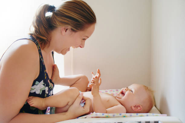 istock Nothing like a fresh diaper to make baby happy 979627336