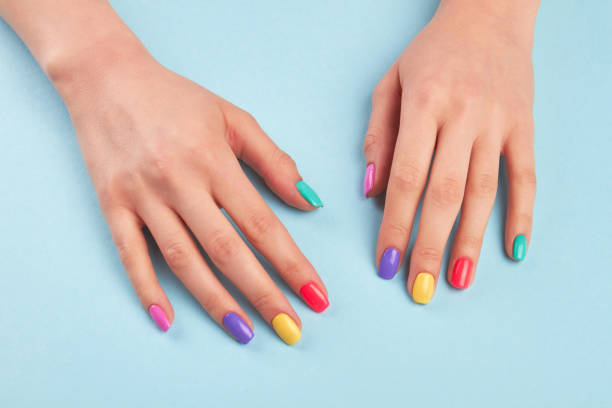 istock Female hands with beautiful summer manicure. 979630314
