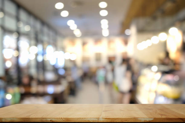 istock Empty wooden table in cafe for product display montage. 979631246
