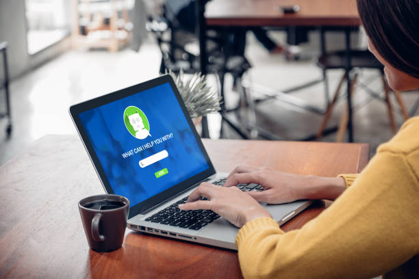 istock Asia woman ask chat bot function in app on laptop screen looking for customer support online shopping shop with apps,digital marketing concept,artificial intelligence (ai) system. 979647756