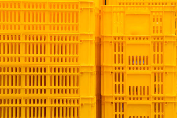 istock yellow plastic crate for food product transportation 979648028