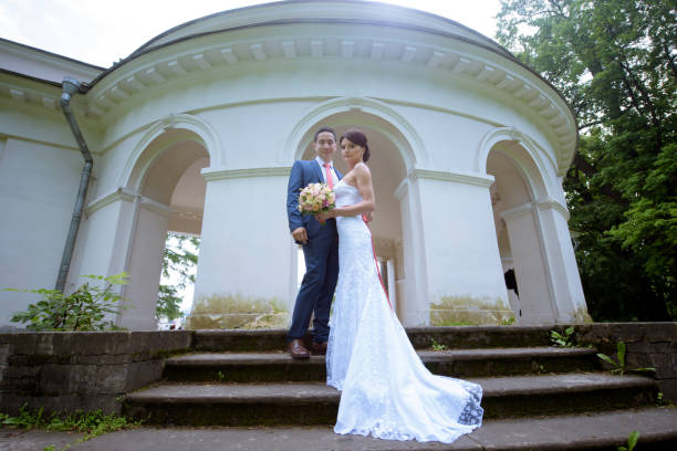 istock Wedding couple on the nature is hugging each other 979650570