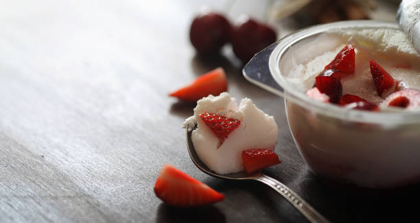 istock Fresh yogurt with berries. Ice cream in a bowl with fresh and ju 979650812