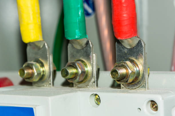istock Closeup of electrical wires in switchgear cabinet 979657998