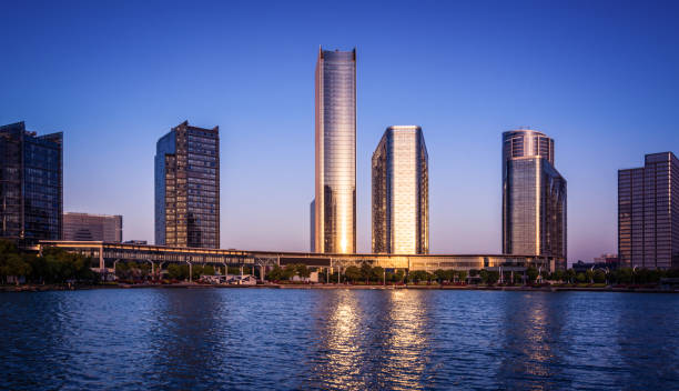 istock office building near the lake in sunset 979658108