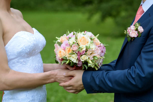 istock Wedding couple on the nature is hugging each other 979660914