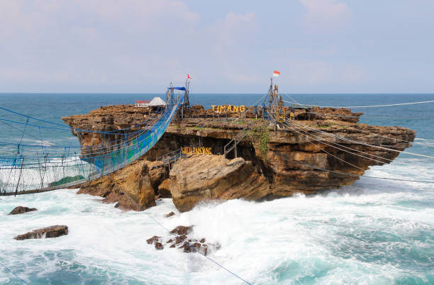 istock Suspension bridge connecting to the Timang Beach 979670648