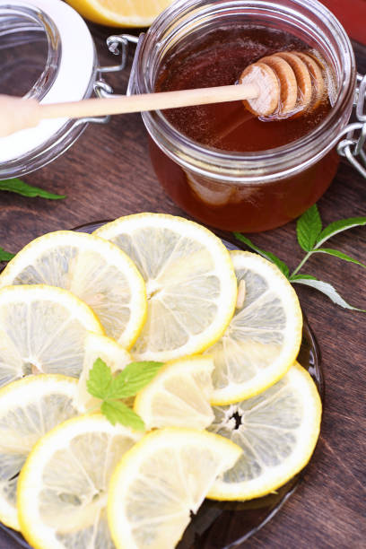 istock Fresh honey with a cup of black tea 979679434
