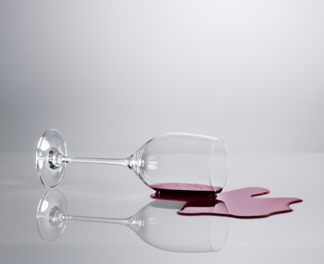red wine and wine glasses on white