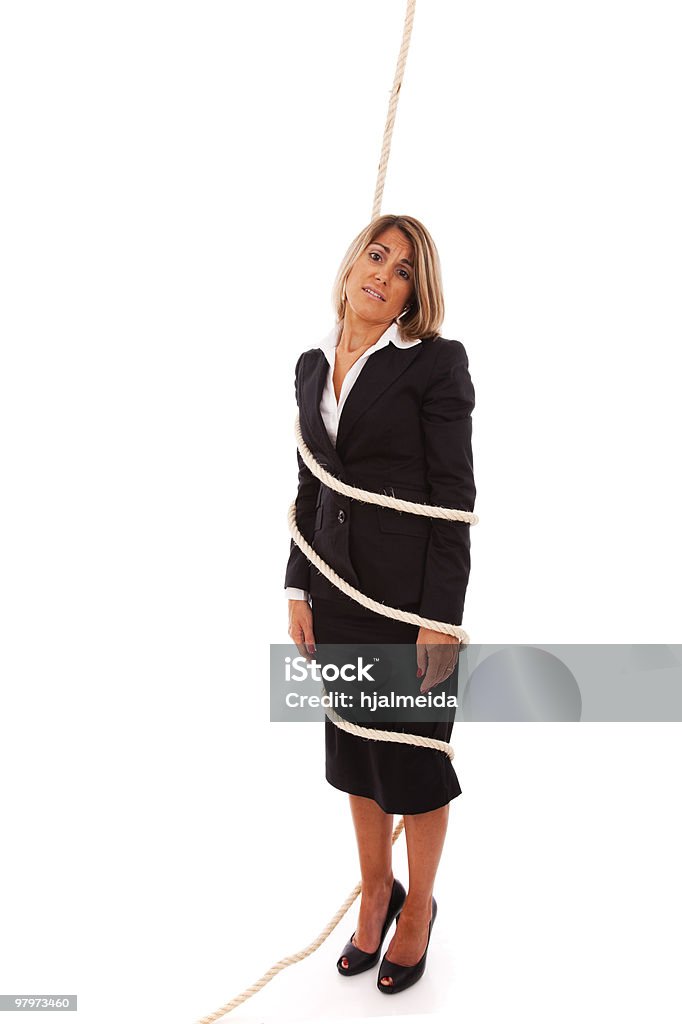 Donna d'affari legati con corda - Foto stock royalty-free di Corda da acrobata