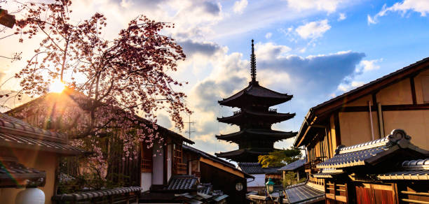 Kyoto - Japan - April 9, 2017:Yasaka Pagoda and Sannen Zaka Street, Kyoto, Japan. Tourists wander down the narrow streets of the Higashiyama District neighbourhood in Kyoto, Japan