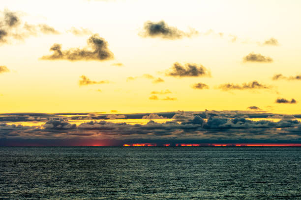 The Terry Pines Beach sunset, La Jolla city in background, early summer