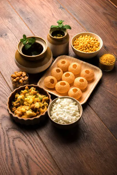 Pani Puri OR Golgappa is a popular Indian Chat menu, selective focus