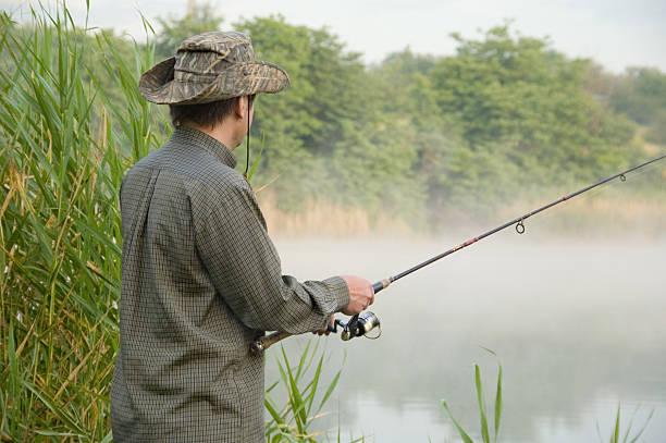 early mofning fishing stock photo