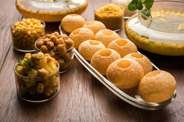 Pani Puri OR Golgappa is a popular Indian Chat menu, selective focus