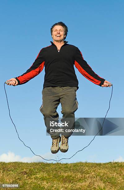 Man Skipping Stock Photo - Download Image Now - Jump Rope, Men, 40-44 Years