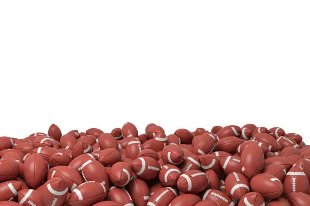 3d rendering of a heap made of countless American football balls lying on each other on a white background. Sport and recreation. Professional playing. Teamwork and winning points.