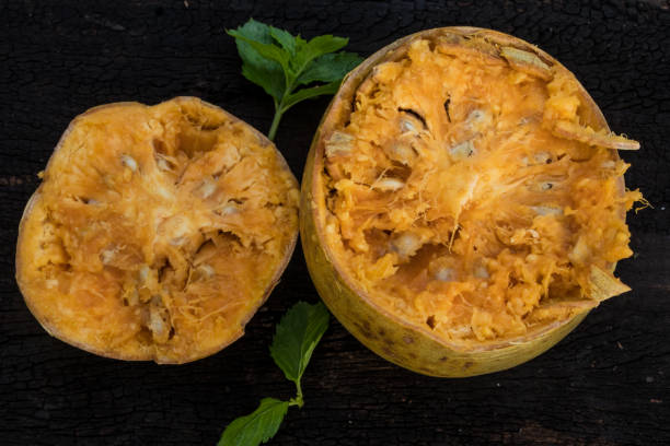 istock Image of bael fruit and a glass of bael juice 979866558