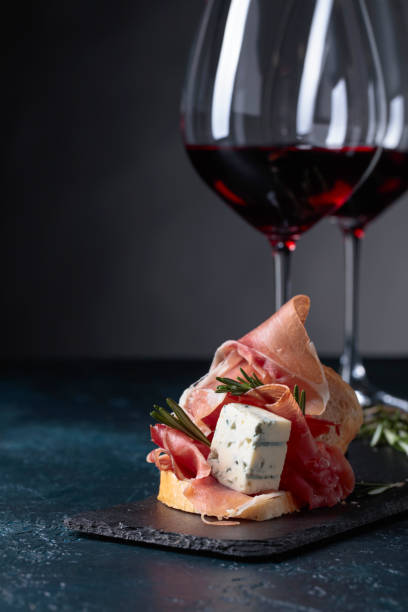 istock Sandwich with prosciutto, blue cheese and rosemary . 979877506