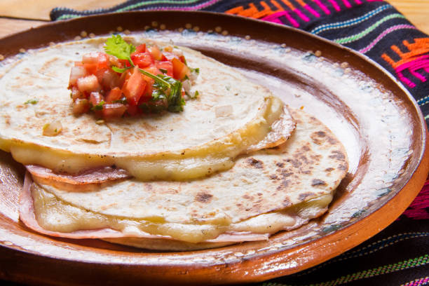 istock Mexican sincronizada with ham  and sauce 979877960