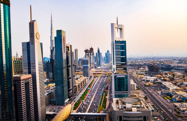 istock Modern skyscrapers of downtown Dubai from a rooftop at sunset 979892106