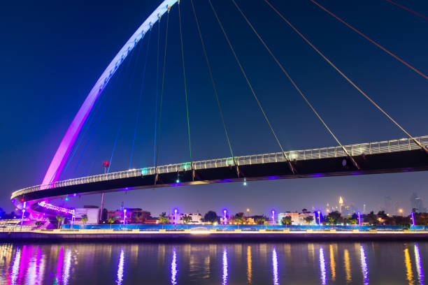 istock Dubai water canal bridge at night 979892380